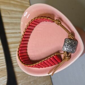 Plunder..Alexis Kate red bead bracelet with silver button clasp.